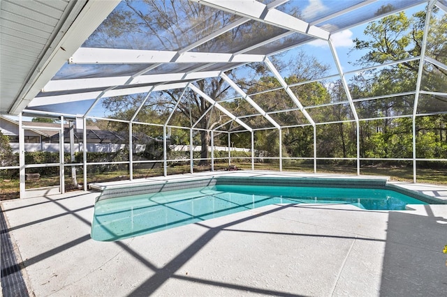 view of swimming pool featuring a fenced in pool, a lanai, and a patio