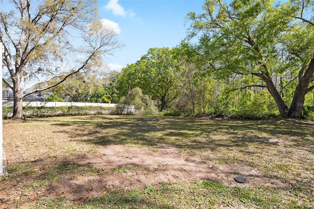 view of yard featuring fence