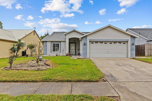 single story home featuring a garage, fence, concrete driveway, stucco siding, and a front lawn