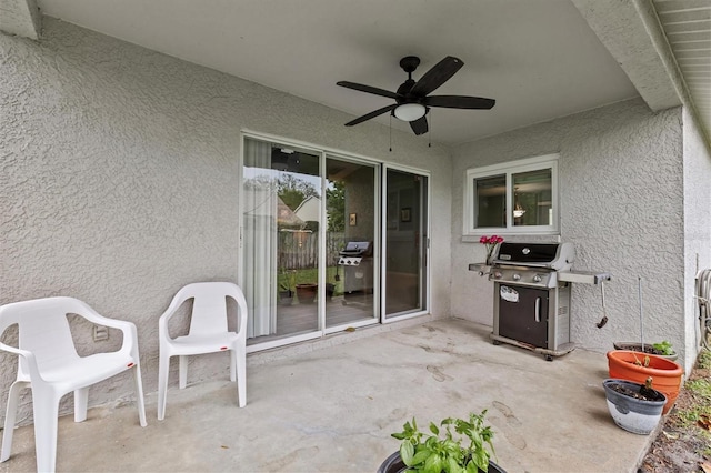 view of patio / terrace with a grill and ceiling fan