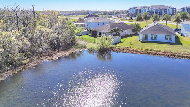 bird's eye view featuring a residential view and a water view