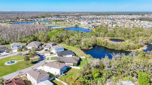 aerial view featuring a residential view and a water view