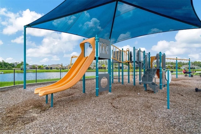 community jungle gym featuring fence