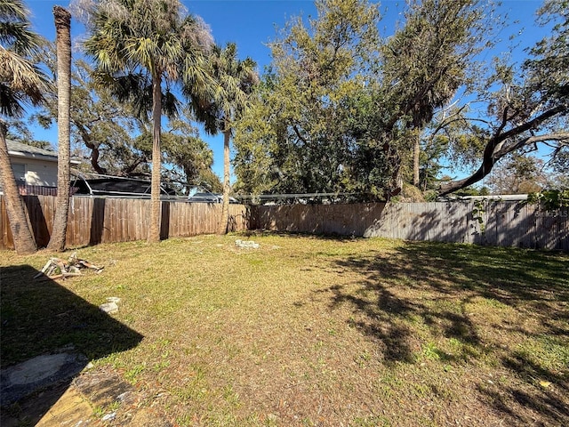 view of yard with fence