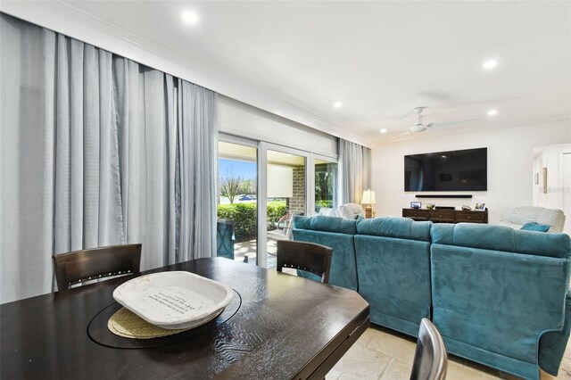 dining space with a ceiling fan and recessed lighting