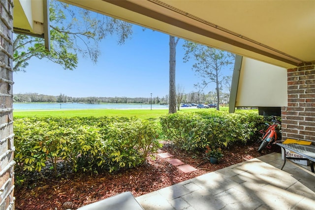 view of yard with a water view