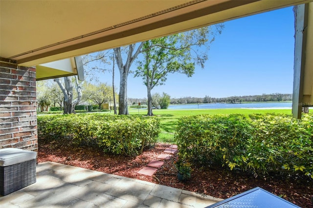 view of yard with a water view