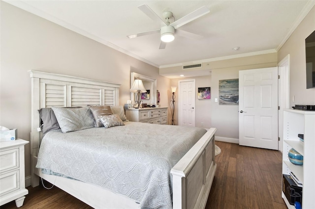 bedroom featuring baseboards, visible vents, a ceiling fan, dark wood-style flooring, and crown molding