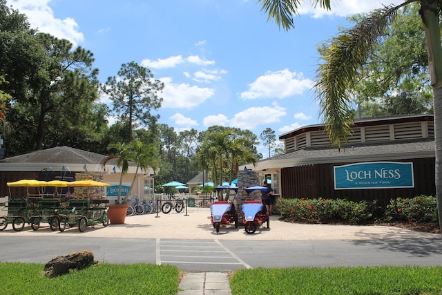 view of property's community with fence