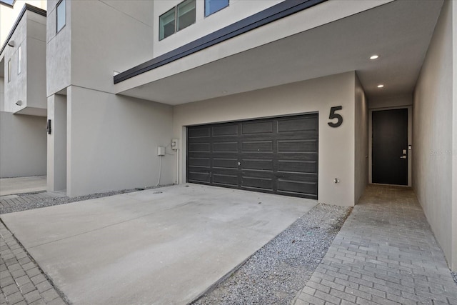 garage with driveway