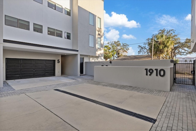 exterior space featuring a gate