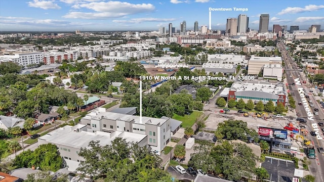 birds eye view of property with a city view