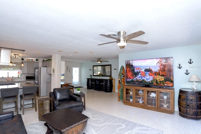 living area with light speckled floor