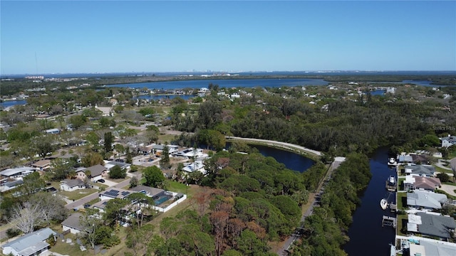 aerial view featuring a water view and a residential view