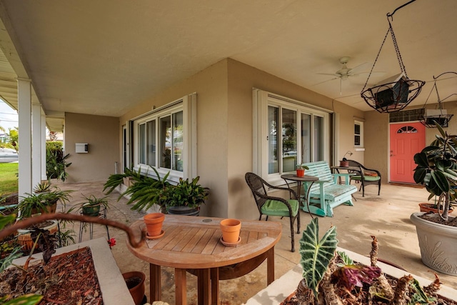 2340 W Bay Isle Dr SE, Saint Petersburg, FL 33705 - view of patio / terrace with ceiling fan and a porch