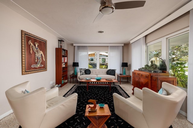 2340 W Bay Isle Dr SE, Saint Petersburg, FL 33705 - living room with speckled floor, visible vents, and baseboards