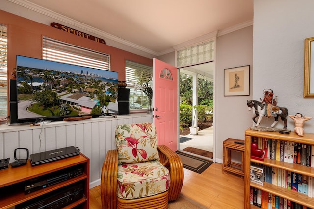 2340 W Bay Isle Dr SE, Saint Petersburg, FL 33705 - sitting room featuring ornamental molding and wood finished floors