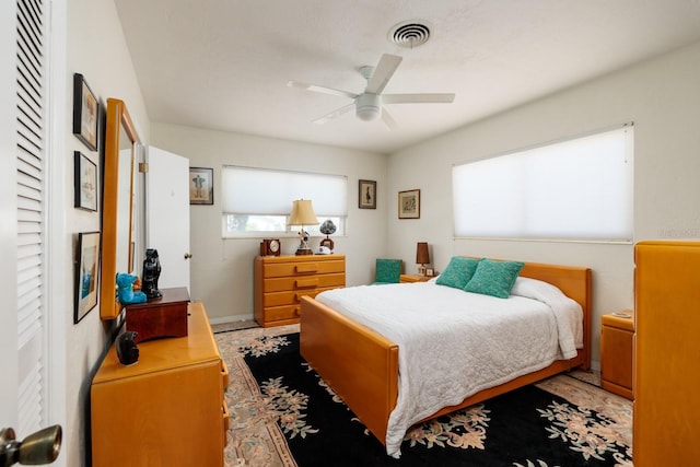 2340 W Bay Isle Dr SE, Saint Petersburg, FL 33705 - bedroom with ceiling fan, visible vents, and baseboards