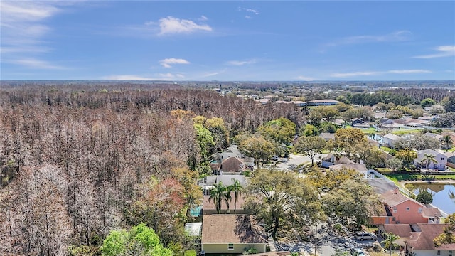 bird's eye view featuring a residential view and a forest view