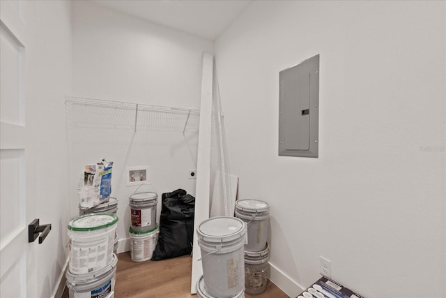 3902 E Henry Ave, Tampa, FL 33610 - laundry area featuring laundry area, wood finished floors, electric panel, electric dryer hookup, and washer hookup