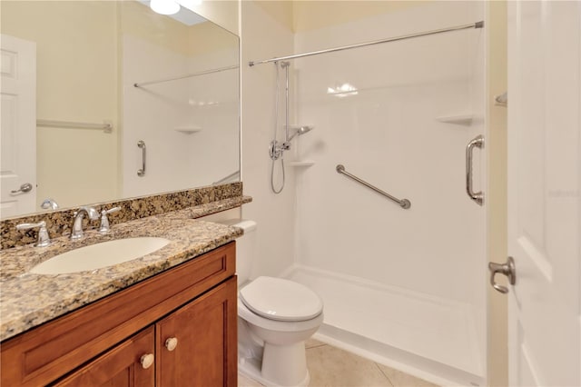 full bathroom with toilet, a stall shower, tile patterned floors, and vanity