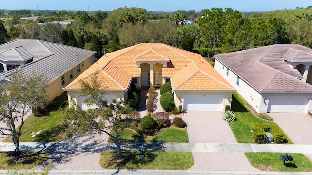 aerial view featuring a view of trees