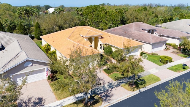 aerial view featuring a wooded view