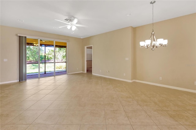 spare room with light tile patterned floors, ceiling fan with notable chandelier, visible vents, and baseboards