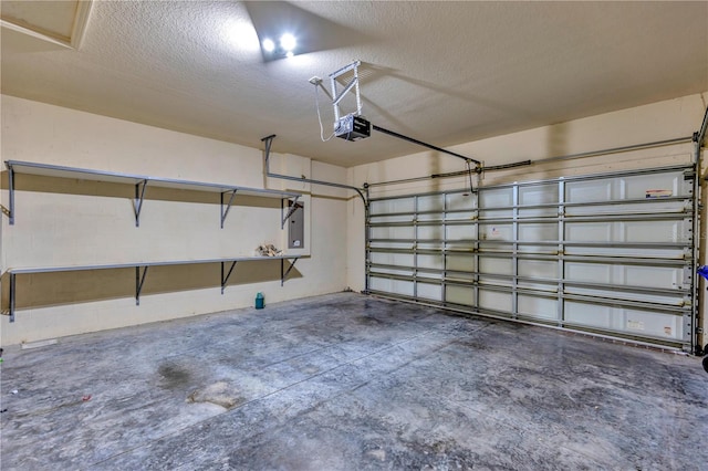 garage featuring electric panel and a garage door opener