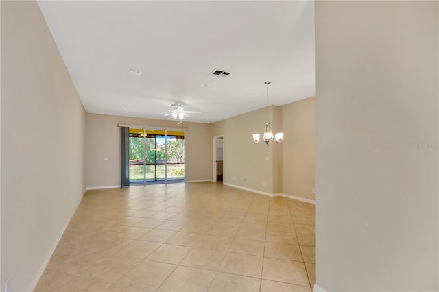 16232 Amethyst Key Dr, Wimauma, FL 33598 - spare room with a chandelier, light tile patterned floors, and ceiling fan