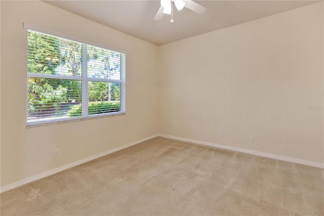 16232 Amethyst Key Dr, Wimauma, FL 33598 - unfurnished room featuring light carpet and a ceiling fan