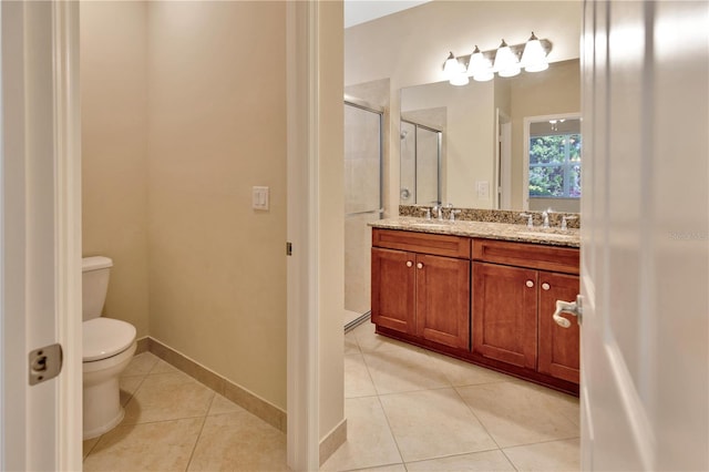 16232 Amethyst Key Dr, Wimauma, FL 33598 - full bathroom featuring tile patterned floors, double vanity, and a stall shower