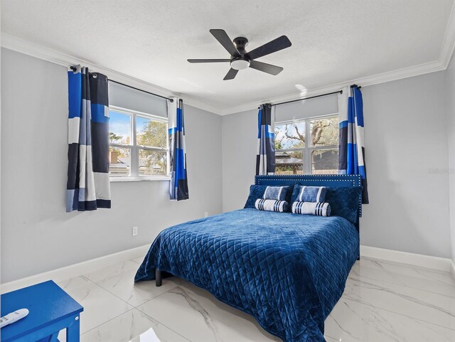 bedroom featuring marble finish floor, crown molding, and baseboards