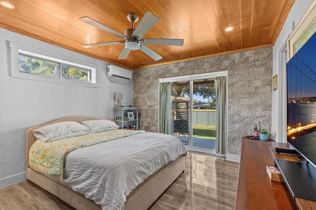 bedroom featuring wooden ceiling, ornamental molding, wood finished floors, and a wall mounted air conditioner