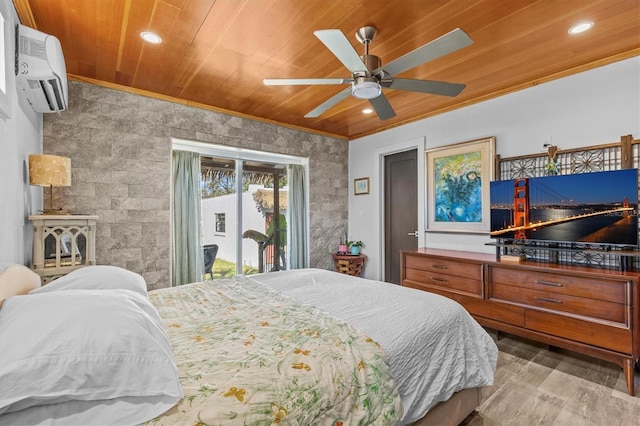 bedroom featuring wood ceiling, crown molding, and a wall mounted AC