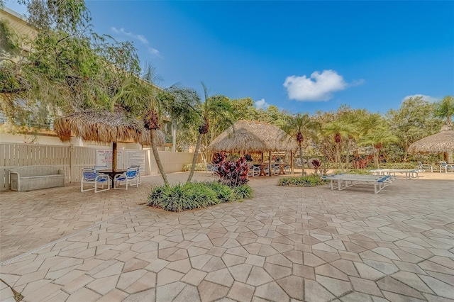 view of patio / terrace with a gazebo and fence