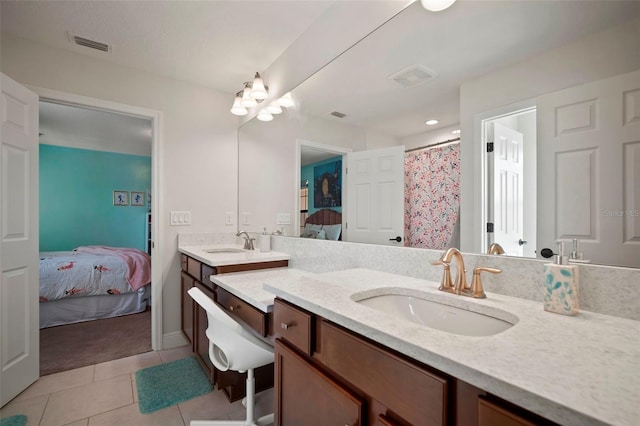 full bathroom with tile patterned floors, vanity, visible vents, and ensuite bathroom