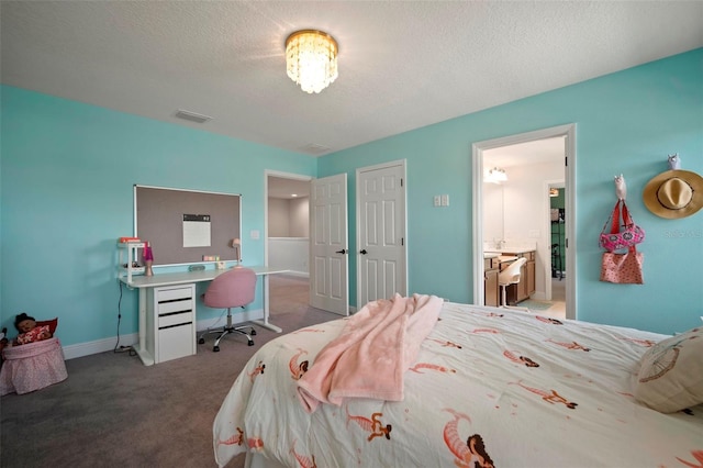 carpeted bedroom featuring visible vents, ensuite bath, a textured ceiling, and baseboards