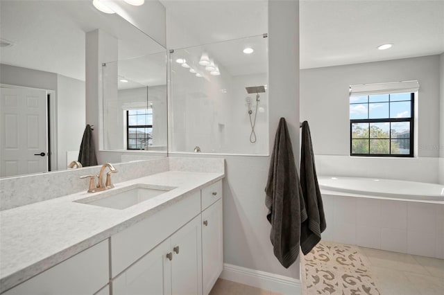 bathroom with tile patterned flooring, recessed lighting, vanity, a tile shower, and a bath