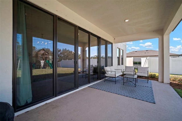 view of patio / terrace with fence