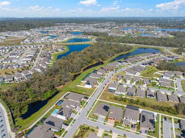 aerial view with a water view and a residential view