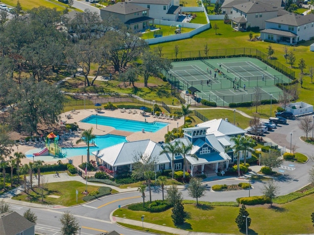 birds eye view of property with a residential view