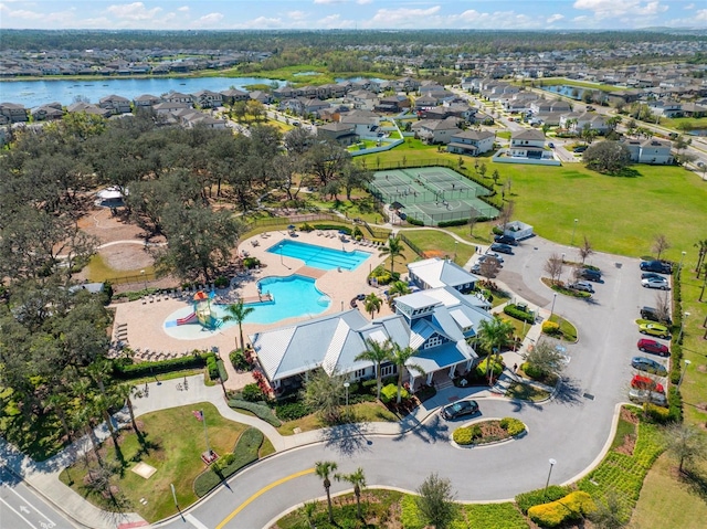 bird's eye view with a residential view and a water view