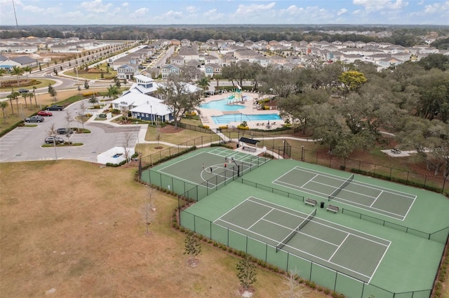 birds eye view of property with a residential view