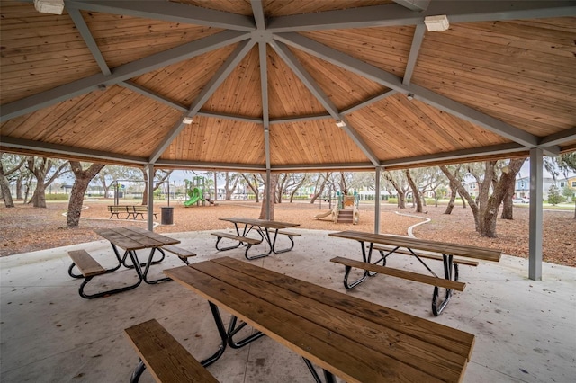 view of community featuring playground community and a gazebo