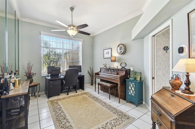 office area with ceiling fan, crown molding, baseboards, and light tile patterned floors