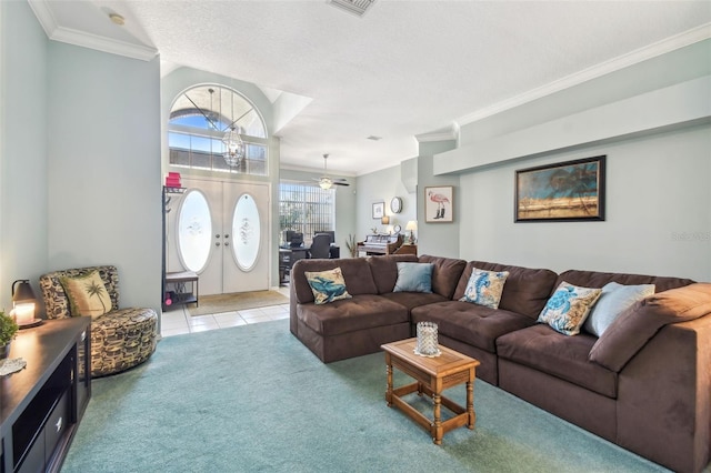 living room featuring light carpet, light tile patterned floors, crown molding, and french doors