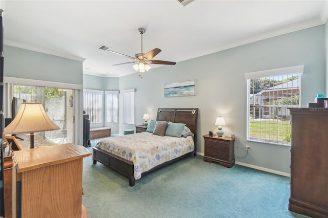 bedroom featuring carpet, multiple windows, and crown molding