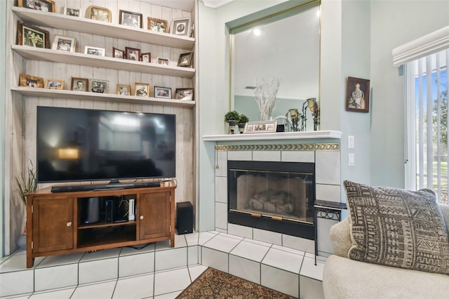 tiled living area with a tile fireplace