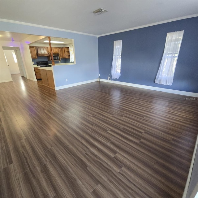 unfurnished living room featuring baseboards, dark wood-style flooring, visible vents, and crown molding